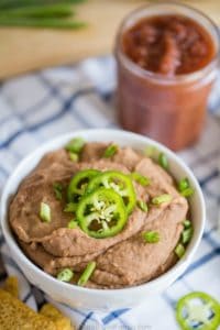 Enjoy restaurant style refried beans without sacrificing your health. These oil-free, plant-based refried beans are made in the Instant Pot.